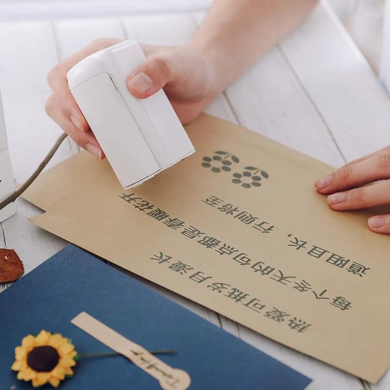 Handheld tattoo printer
