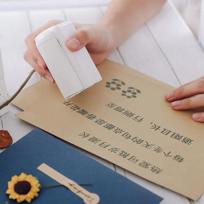 Handheld tattoo printer